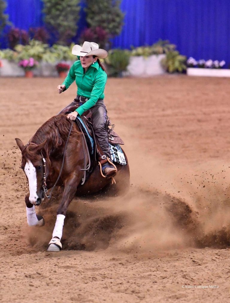 Heather Thompson performs at reining event